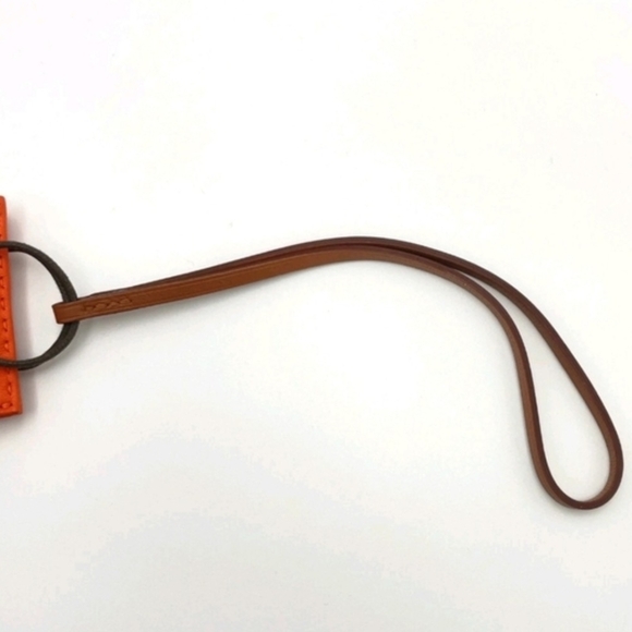 HERMÈS ORANGE LEATHER MINI POUCH BAG CHARM KEY HOLDER + BOX - Picture 11 of 12